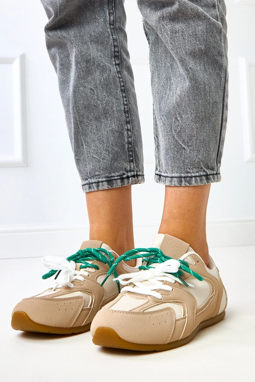 Beige sportieve schoenen met dubbele... Beige sportieve schoenen met dubbele...