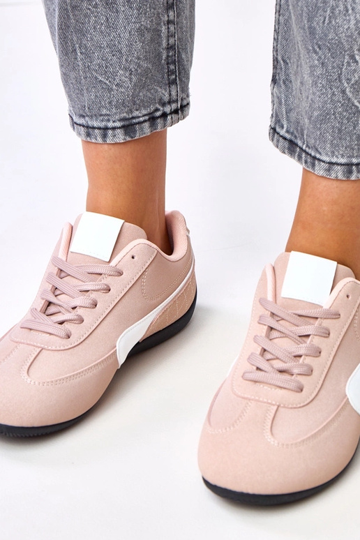 Roze sportieve schoenen met witte... Roze sportieve schoenen met witte...