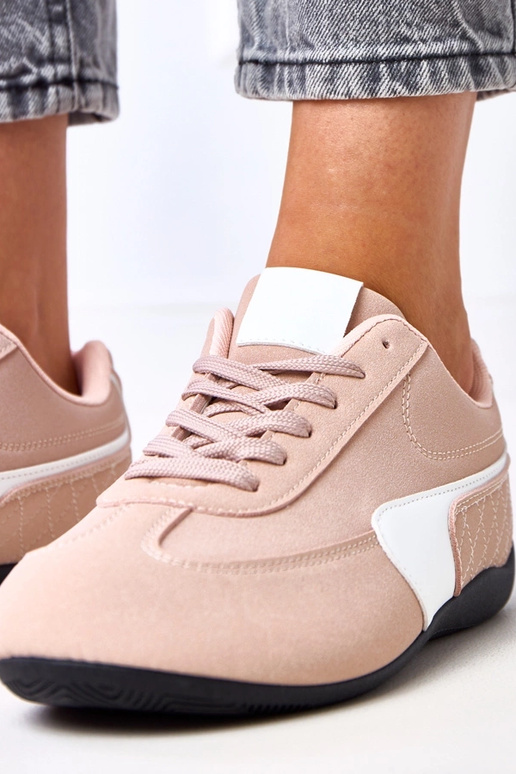 Roze sportieve schoenen met witte... Roze sportieve schoenen met witte...