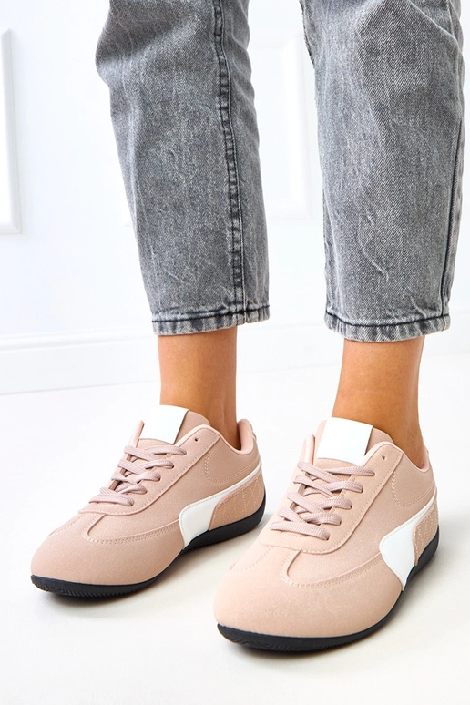 Roze sportieve schoenen met witte... Roze sportieve schoenen met witte...