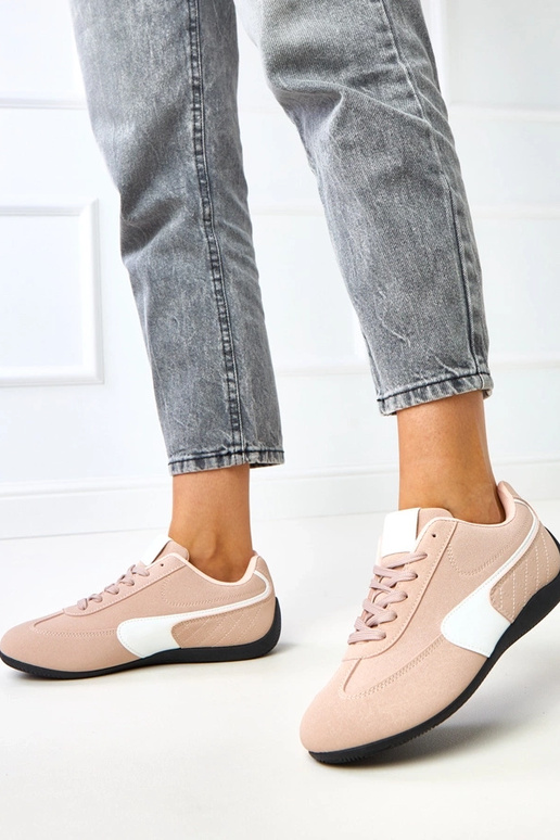 Roze sportieve schoenen met witte... Roze sportieve schoenen met witte...