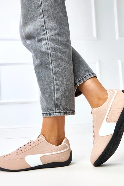 Roze sportieve schoenen met witte... Roze sportieve schoenen met witte...