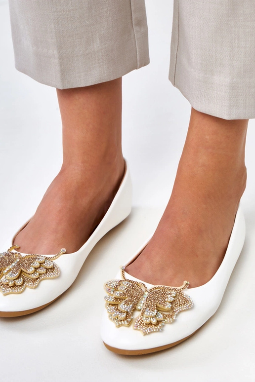 Witte ballerina's met decoratieve... Witte ballerina's met decoratieve...