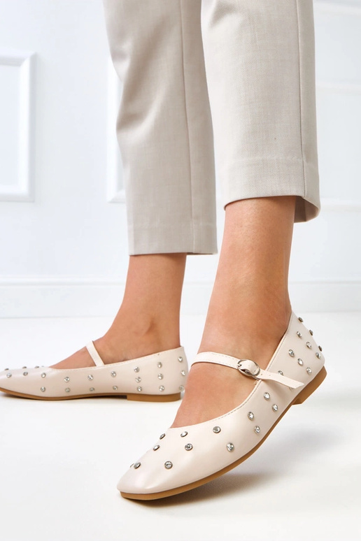 Sandkleurige ballerina's met... Sandkleurige ballerina's met...