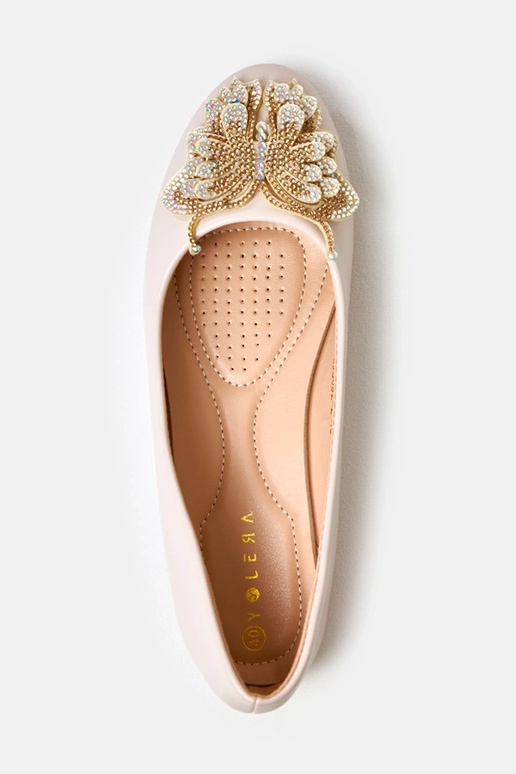 Zandkleurige ballerina's met... Zandkleurige ballerina's met...