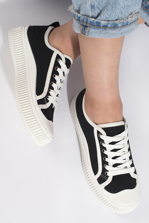 Zwarte dames sneakers met plateau in... Zwarte dames sneakers met plateau in...