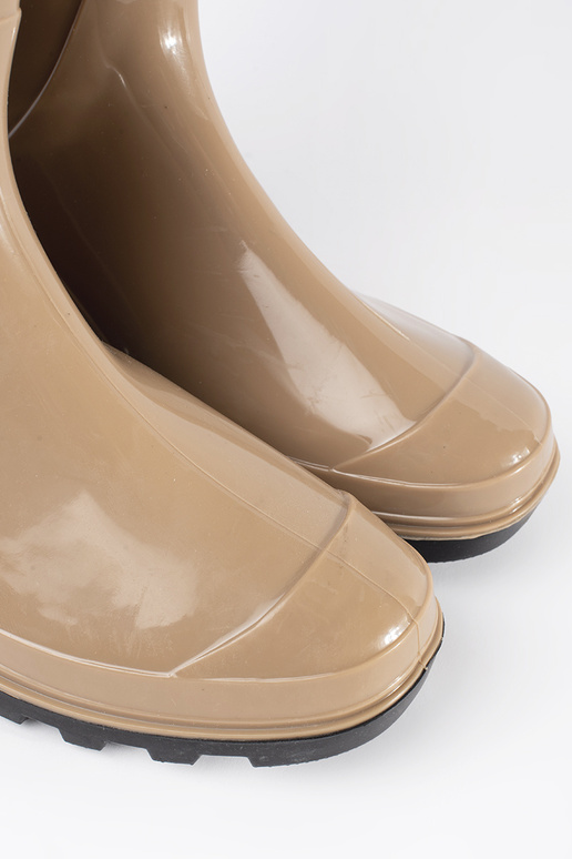 beige gelakt regenlaarzen