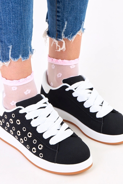 Zwarte sneakers op platform met studs...
