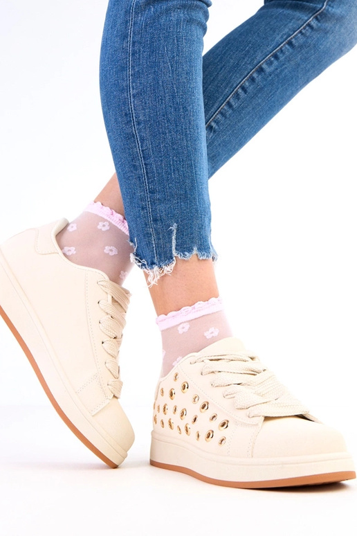 Zandkleurige sneakers op platform met...