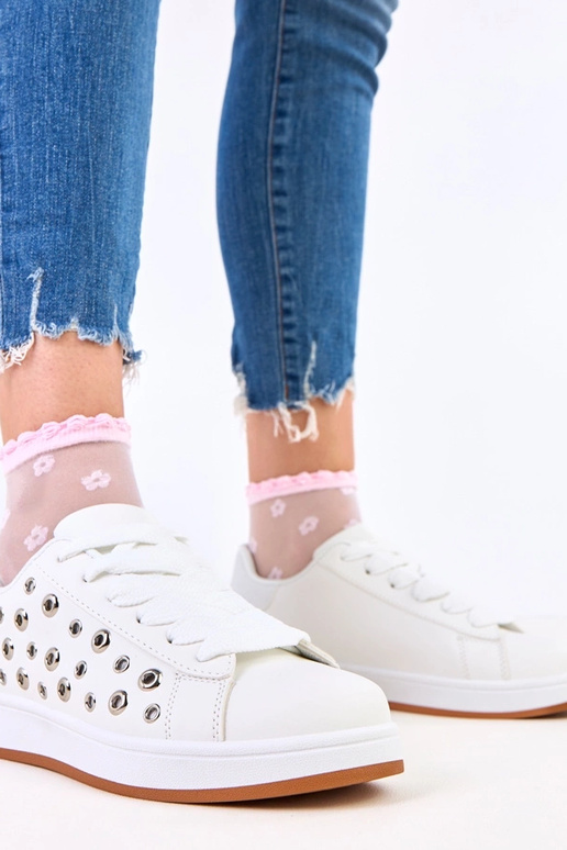 Witte sneakers op platform met studs...