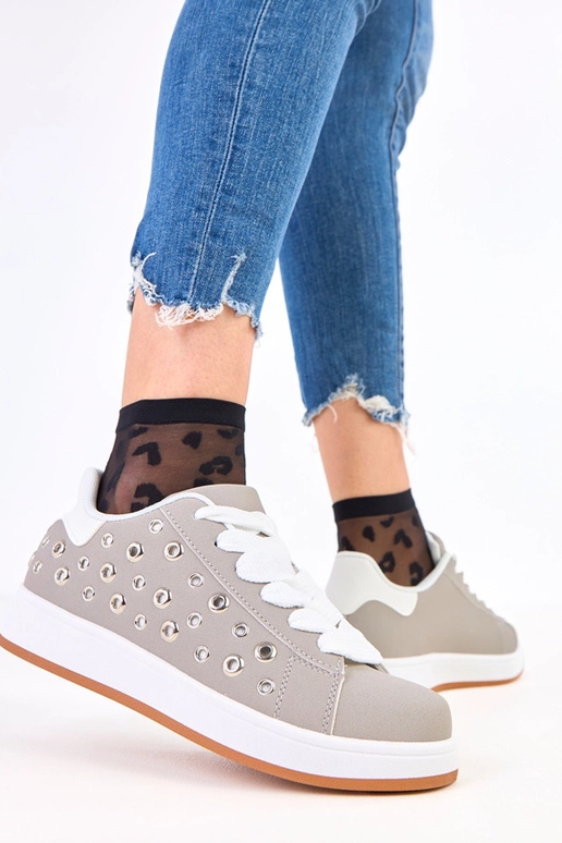 Grijze sportieve schoenen op plateau...