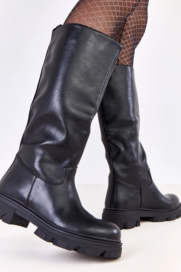 Zwarte instap lange laarzen...