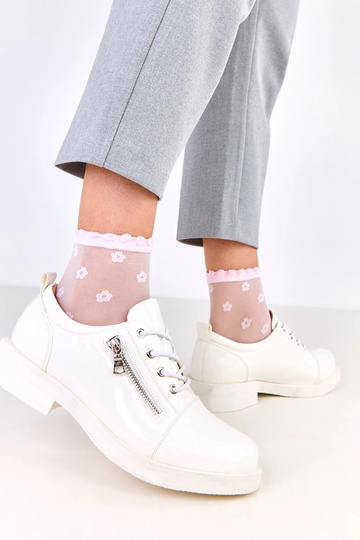 Witte gelakte dames...