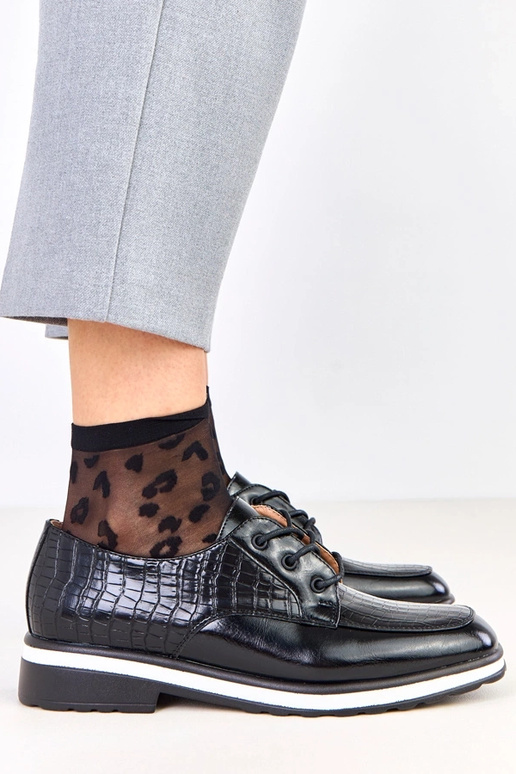 Zwarte halfhoge schoenen met reliëf...