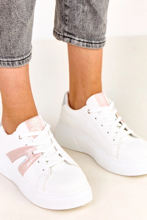 Witte sportieve schoenen met platform...