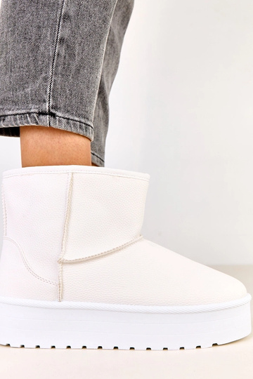 Witte lage sneeuwlaarzen...