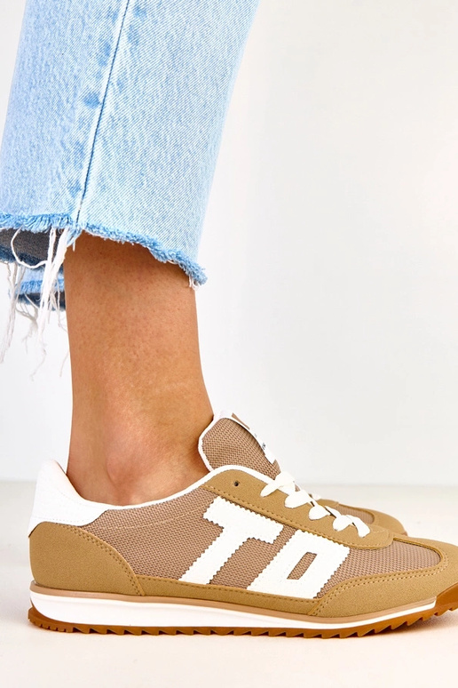 Groene sportschoenen met witte...