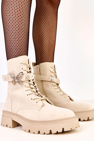 Beige laarzen met een...