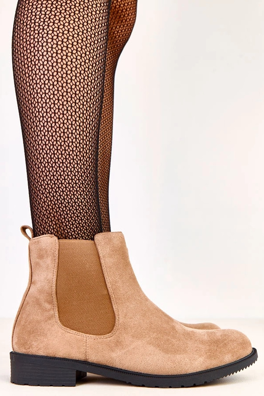 Bruine platte enkellaarsjes met...