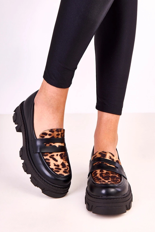 Zwarte mocassins met lederen accent...