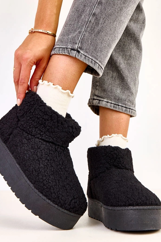 Zwarte sneeuwlaarzen met schapenvacht...