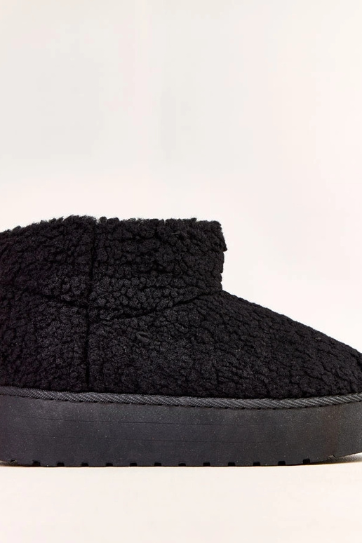 Zwarte sneeuwlaarzen met schapenvacht...