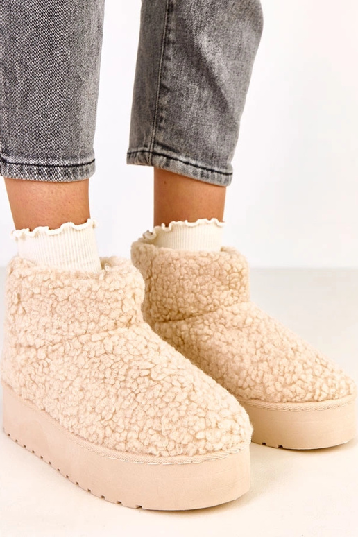 Beige sneeuwlaarzen met schapenvacht...