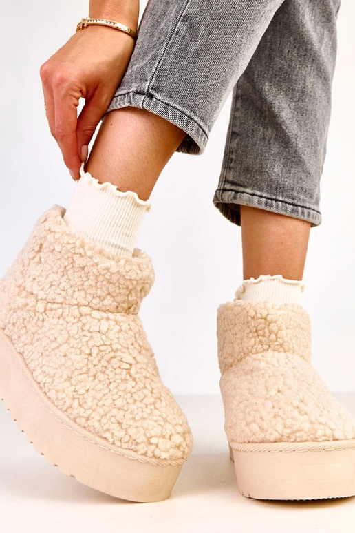 Beige sneeuwlaarzen met schapenvacht...