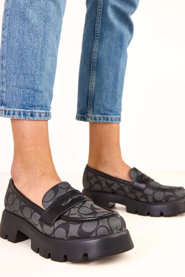 Zwarte mocassins met...