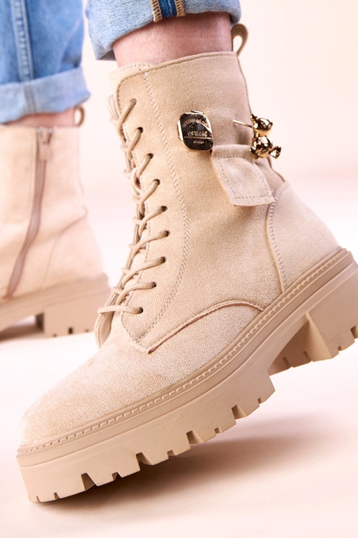 Beige damescargobroek met gouden...