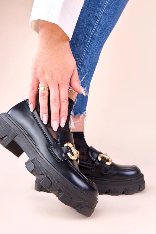 Zwarte instappers met gouden...