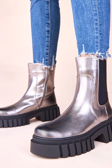 Zilveren enkellaarsjes op...