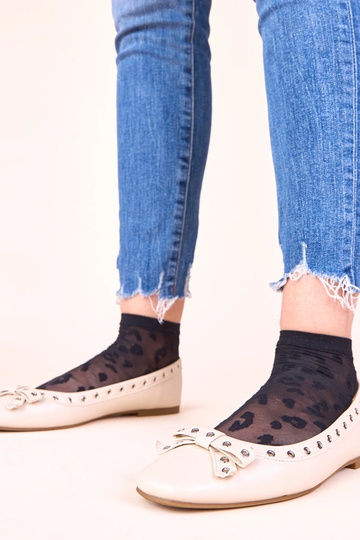 Zandkleurige ballerina's...