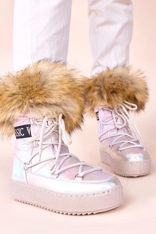 Zilveren sneeuwlaarzen met een roze...