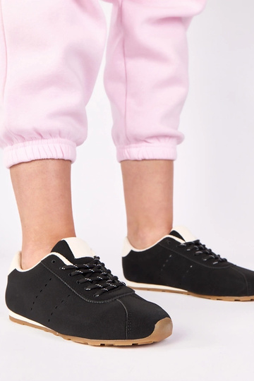 Zwarte sneakers met witte...