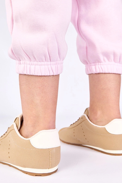 Zandkleurige sneakers met witte...