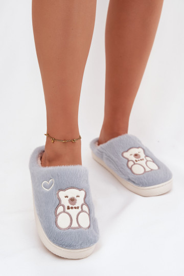 Blauwe Noralie slippers met bont en een teddybeer