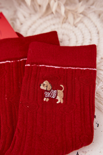 Dames kerstkniekousen met hartjes en een hond in turquoise kleur