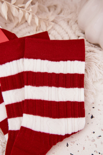 Dames kerstkniekousen met strepen in rood-witte kleur