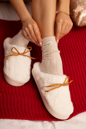 Ivoor kleurige slippers met bont en strikken Minella