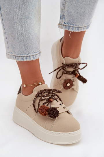 Zandkleurige Corinna dames platform sportschoenen met sierlijke pompons