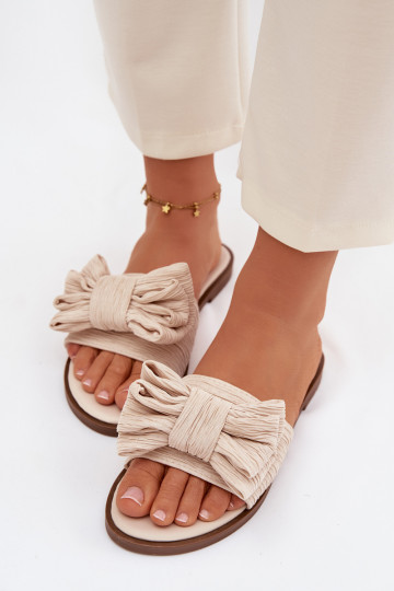 Dames slippers met brede hakken en strikken in zandkleur Amivelle