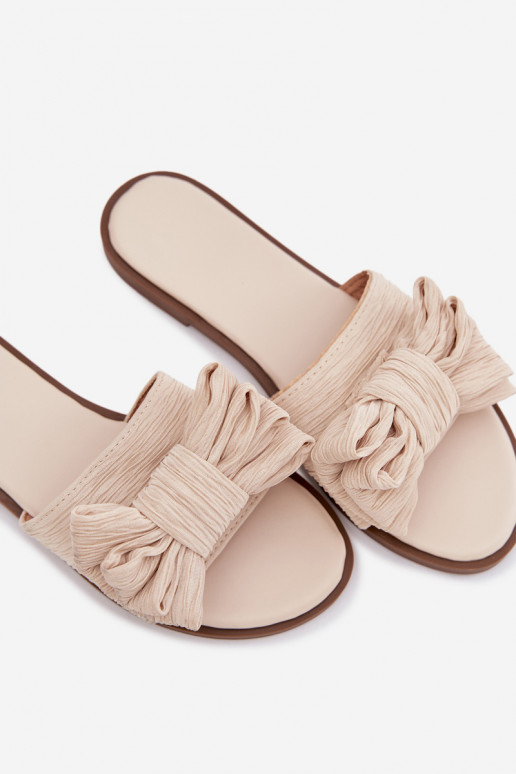 Dames slippers met brede hakken en strikken in zandkleur Amivelle