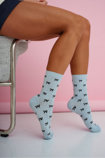 Dameskous met strikjes in blauwe kleur