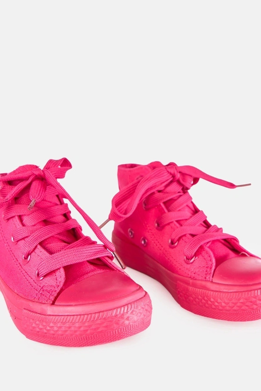 Roze kinder sneakers boven de enkel...