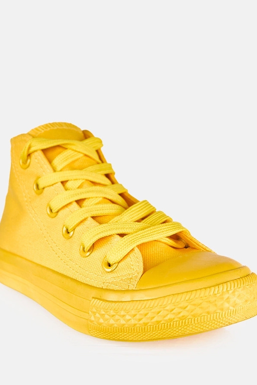 Geel kinder sneakers boven de enkel...