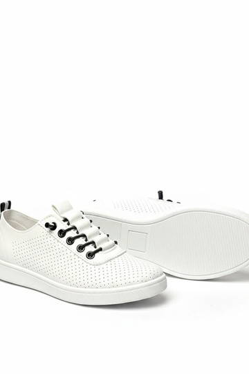 Witte instap perforatiesportschoenen Adèle
