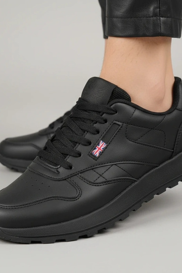 Zwarte casual sportschoenen met plateau Élise