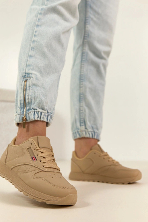 Zandkleurige dagelijkse sportschoenen...