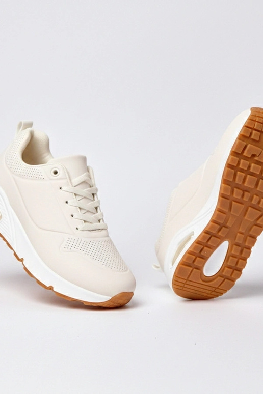 Zandkleurige sportschoenen met dikke...